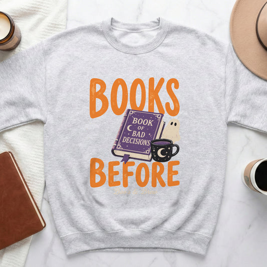 Gray sweatshirt with "Books Before Bad Decisions" graphic of a book and coffee cup.