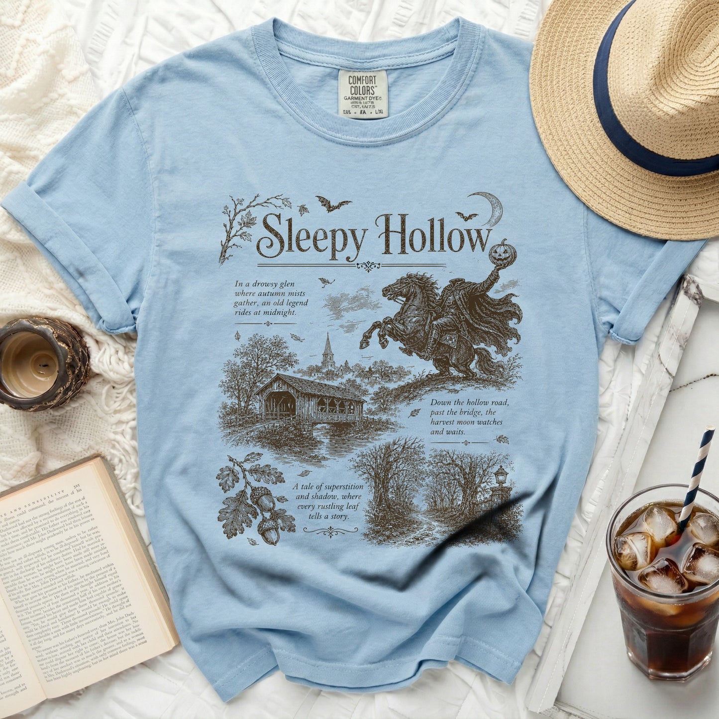 Blue t-shirt with "Sleepy Hollow" graphic and vintage illustration.