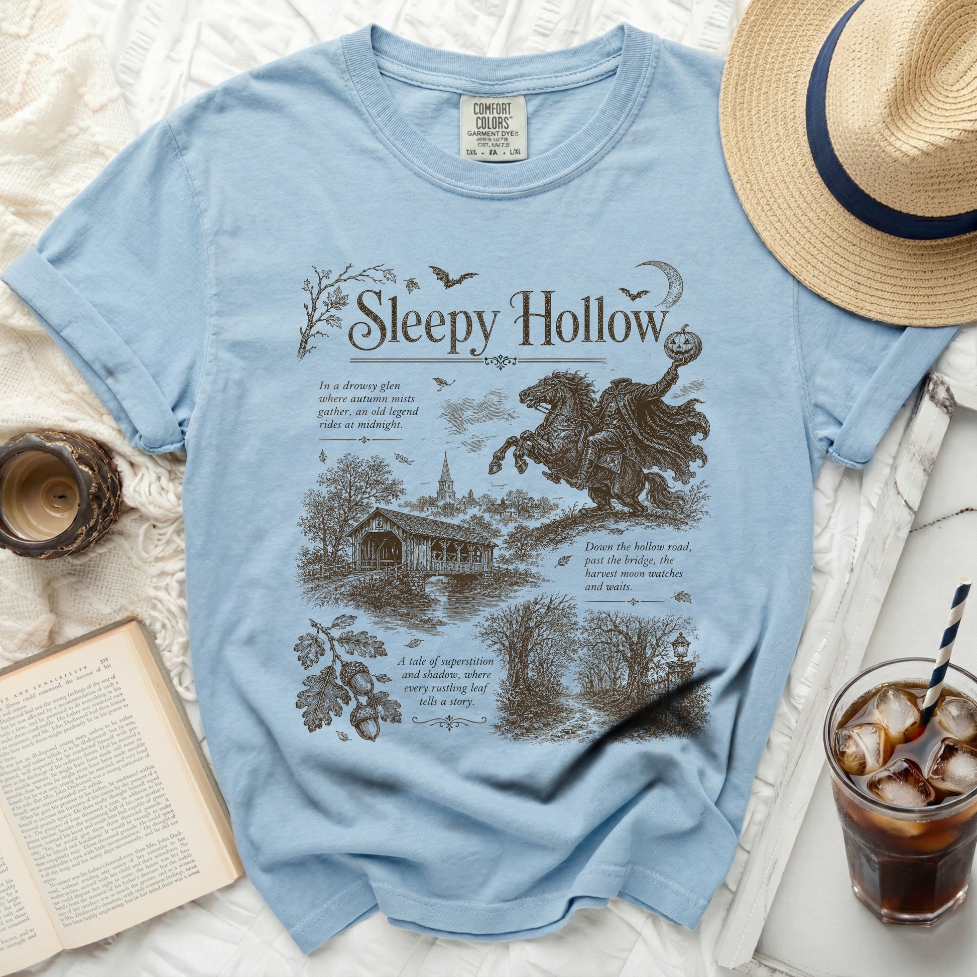 Blue t-shirt with "Sleepy Hollow" graphic and vintage illustration.