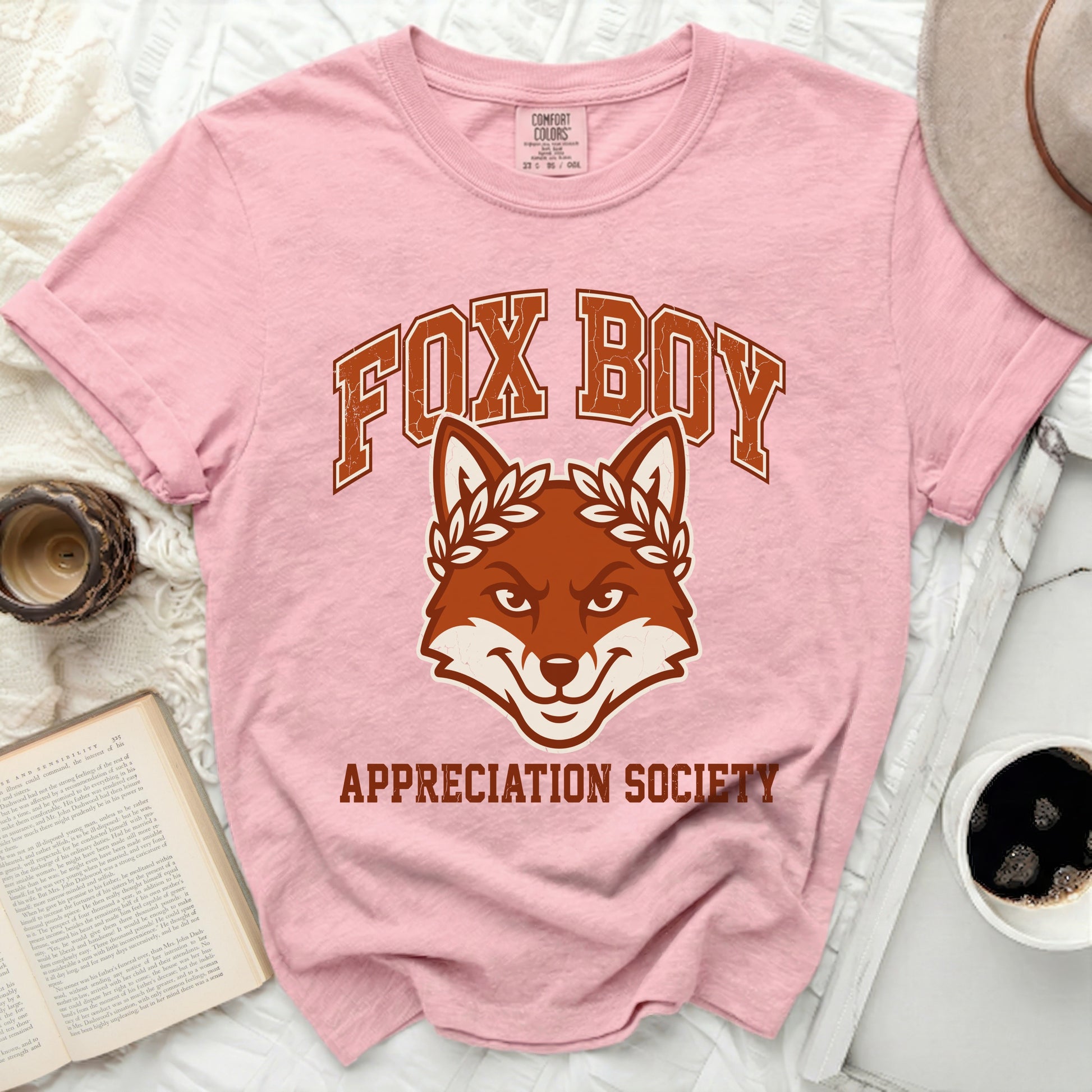 Pink t-shirt with "Fox Boy Appreciation Society" graphic.