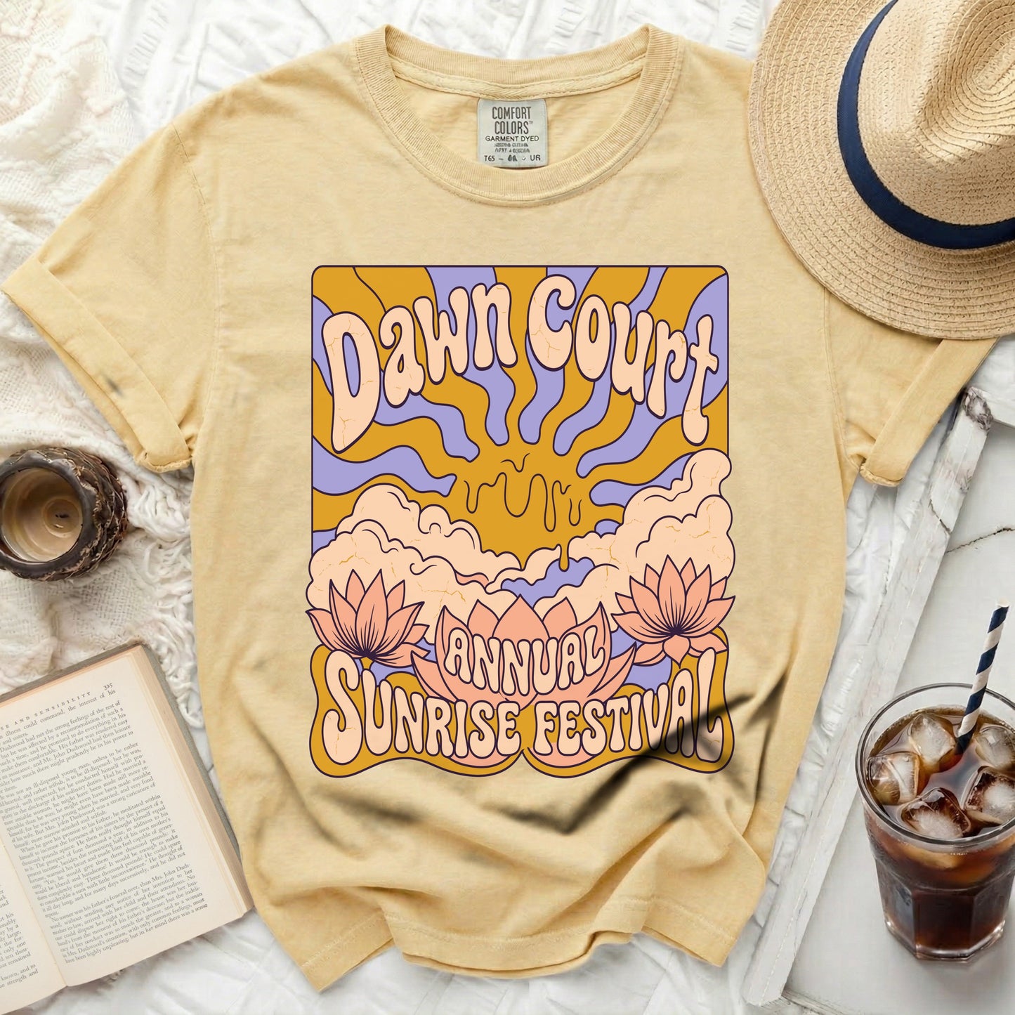Yellow t-shirt with "Dawn Court Annual Sunrise Festival" graphic design.