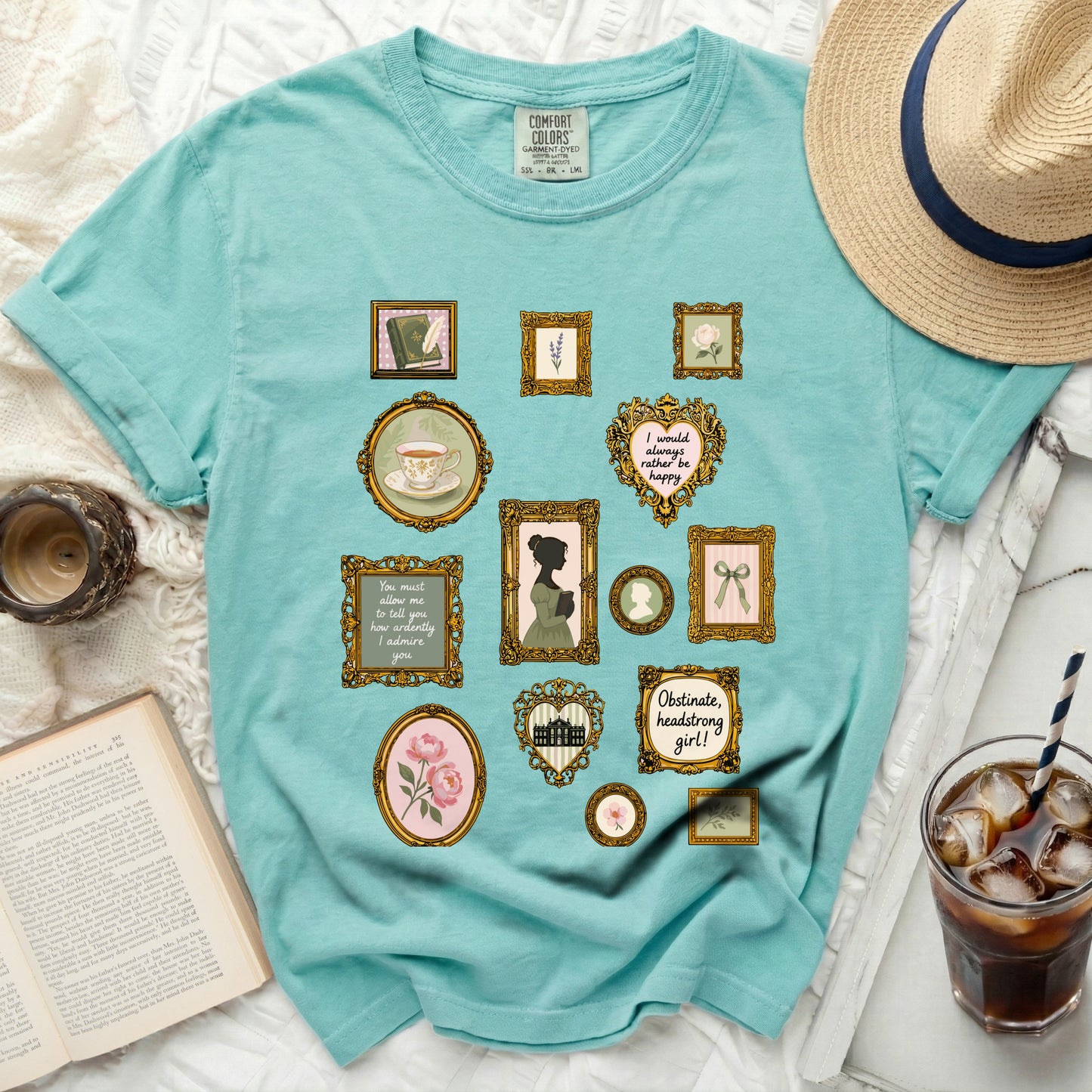 Turquoise comfort colors t-shirt with vintage framed prints of books, flowers, teacups, and quotes.