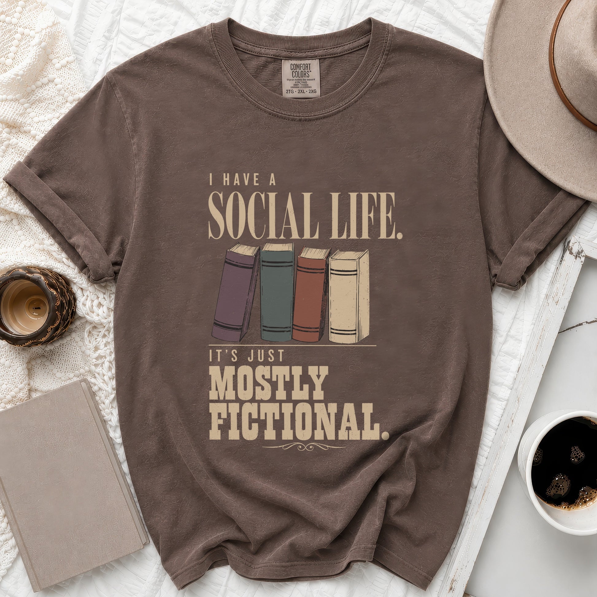 Brown t-shirt with "I Have A Social Life. It's Just Mostly Fictional." text.