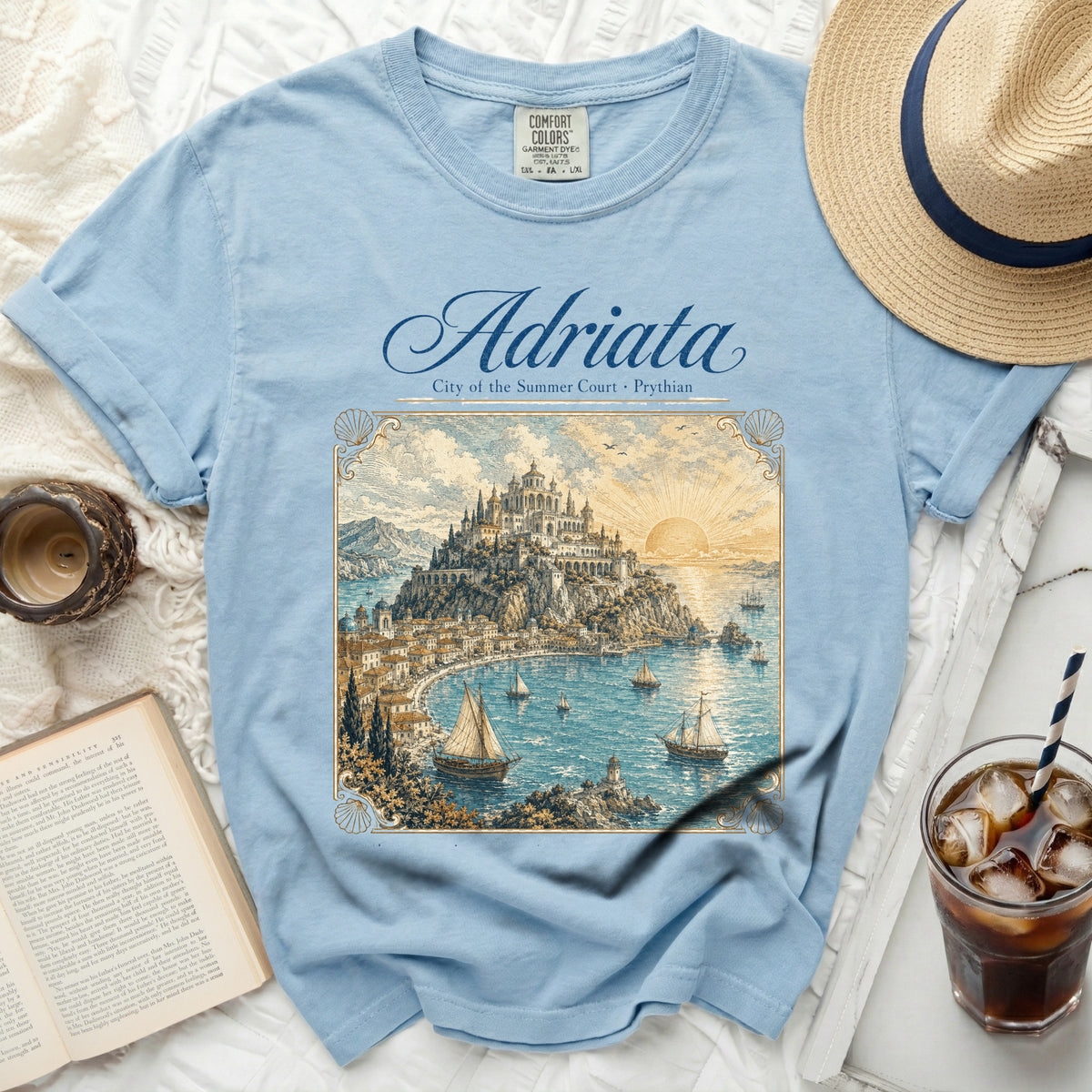 Light blue t-shirt with "Adriata" and a coastal city print.