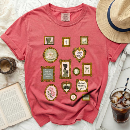 Coral comfort colors t-shirt with framed literary quotes and illustrations.