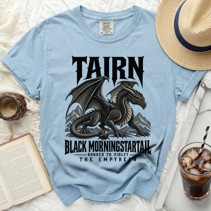 Light blue t-shirt with black dragon graphic and text "TAIRN BLACK MORNINGSTARTAIL"