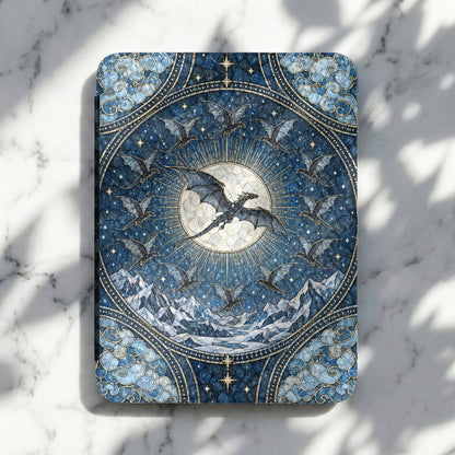 Blue e-reader case featuring a mosaic design of dragons flying around a glowing moon and snowy mountains.