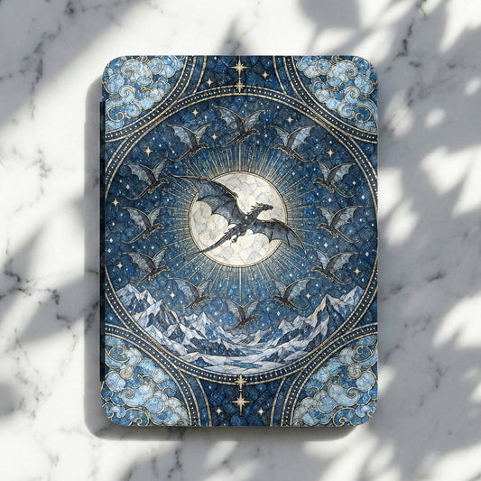 Blue e-reader case featuring a mosaic design of dragons flying around a glowing moon and snowy mountains.
