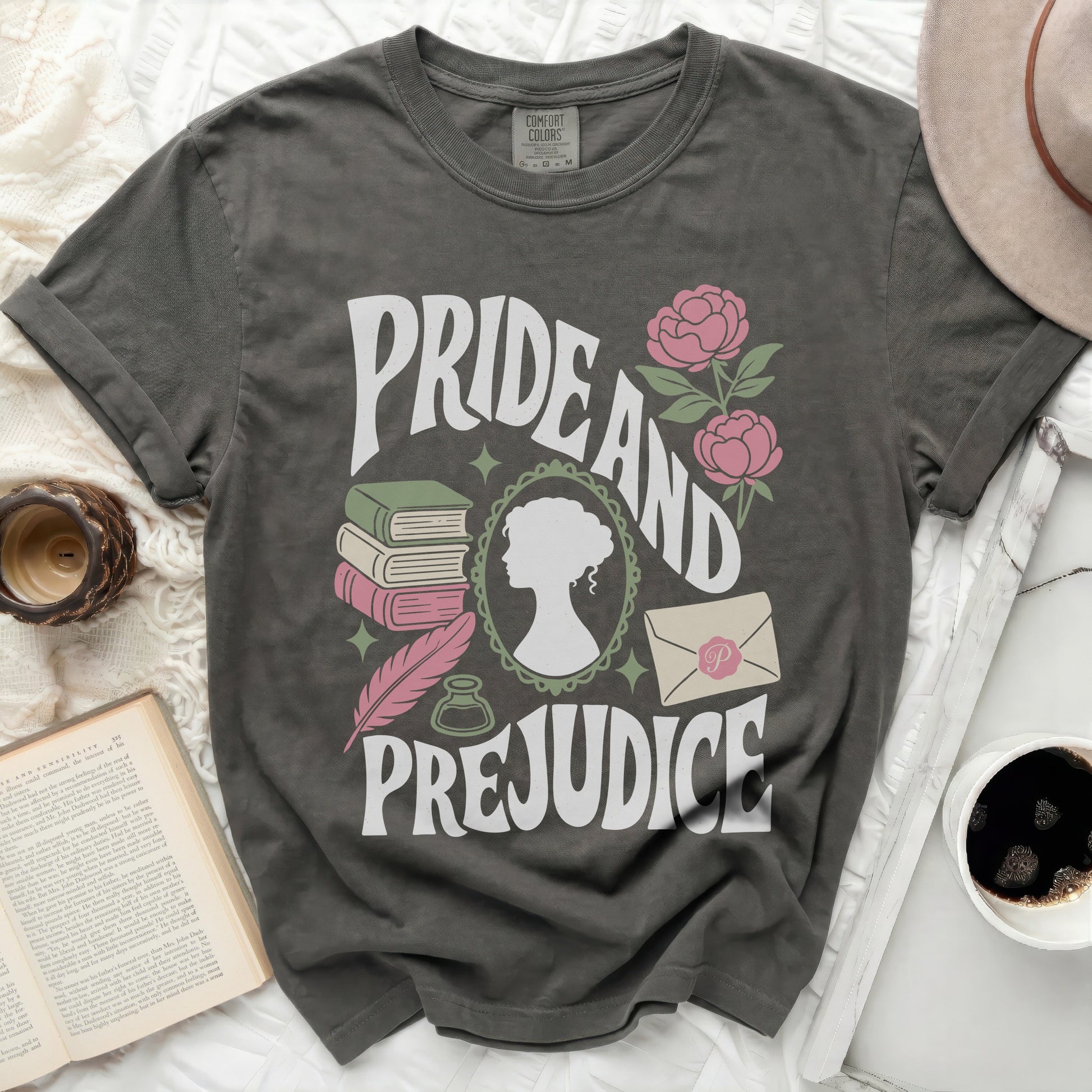 Pride and Prejudice graphic t-shirt with books, feather, and silhouette.