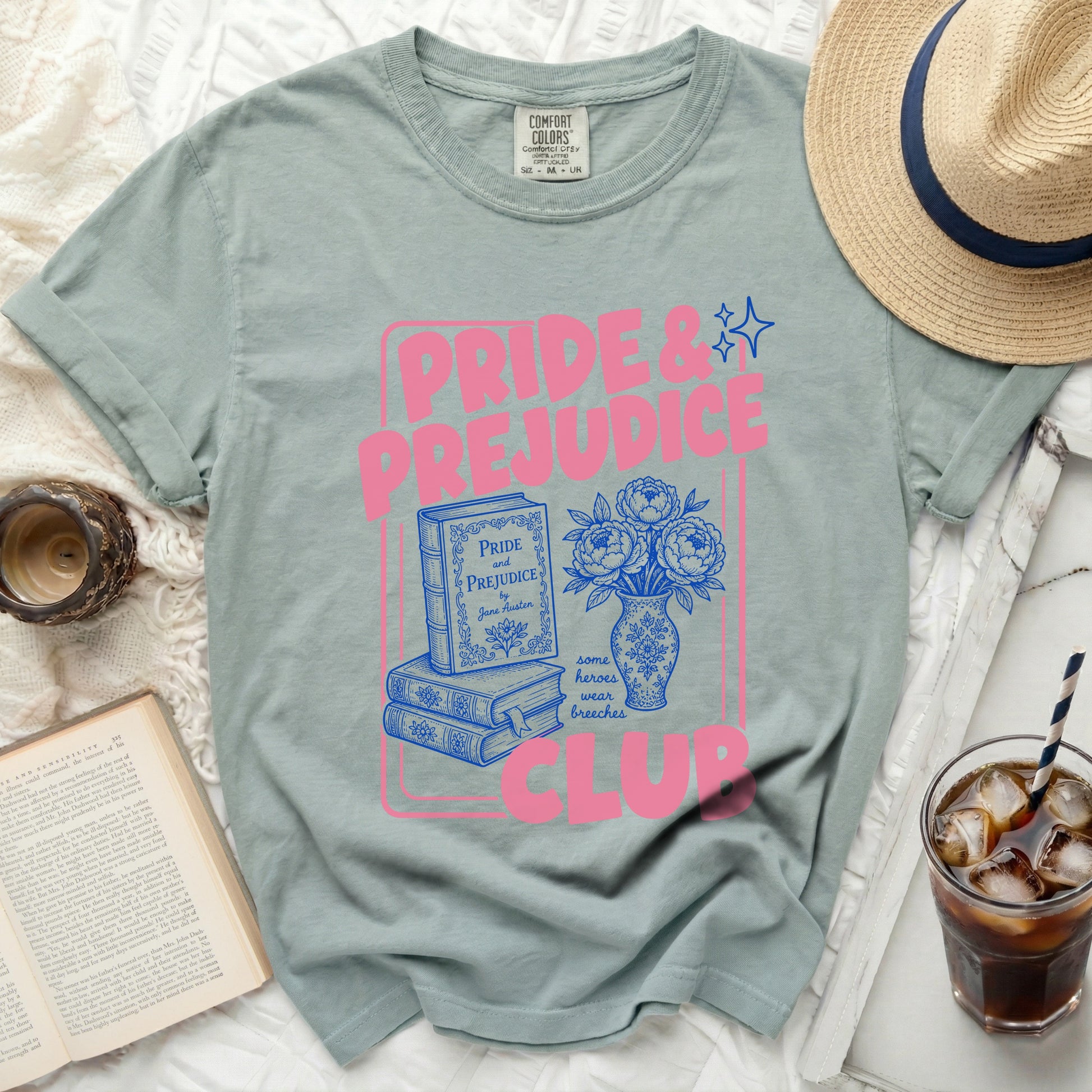 Pride and Prejudice Club graphic on a comfort colors t-shirt.