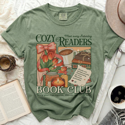 Green t-shirt with "Cozy Readers Book Club" graphic of tulips, books, and hot cocoa.