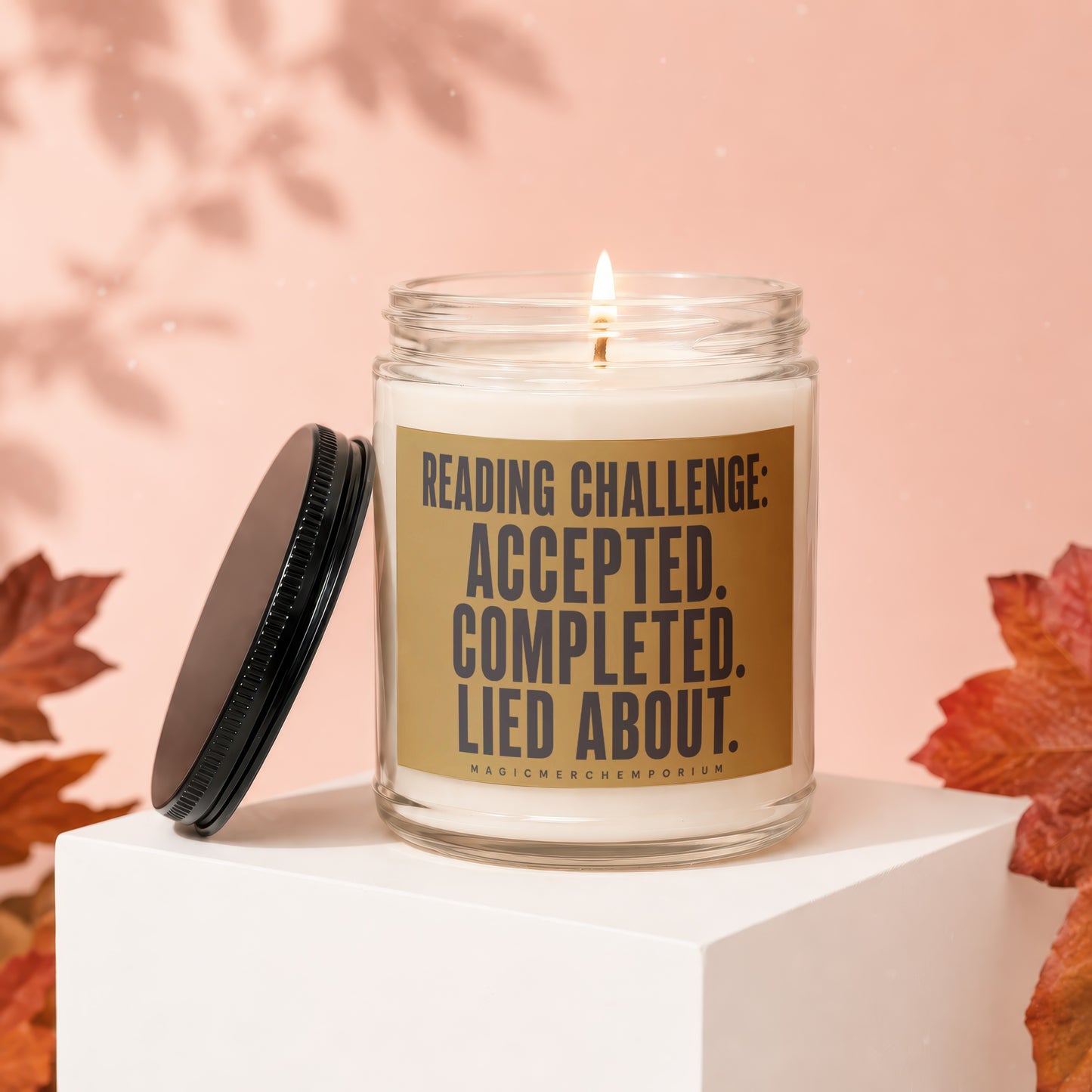 Candle with text: "Reading Challenge: Accepted. Completed. Lied About."