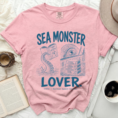 Pink t-shirt with "Sea Monster Lover" and Kraken illustration.