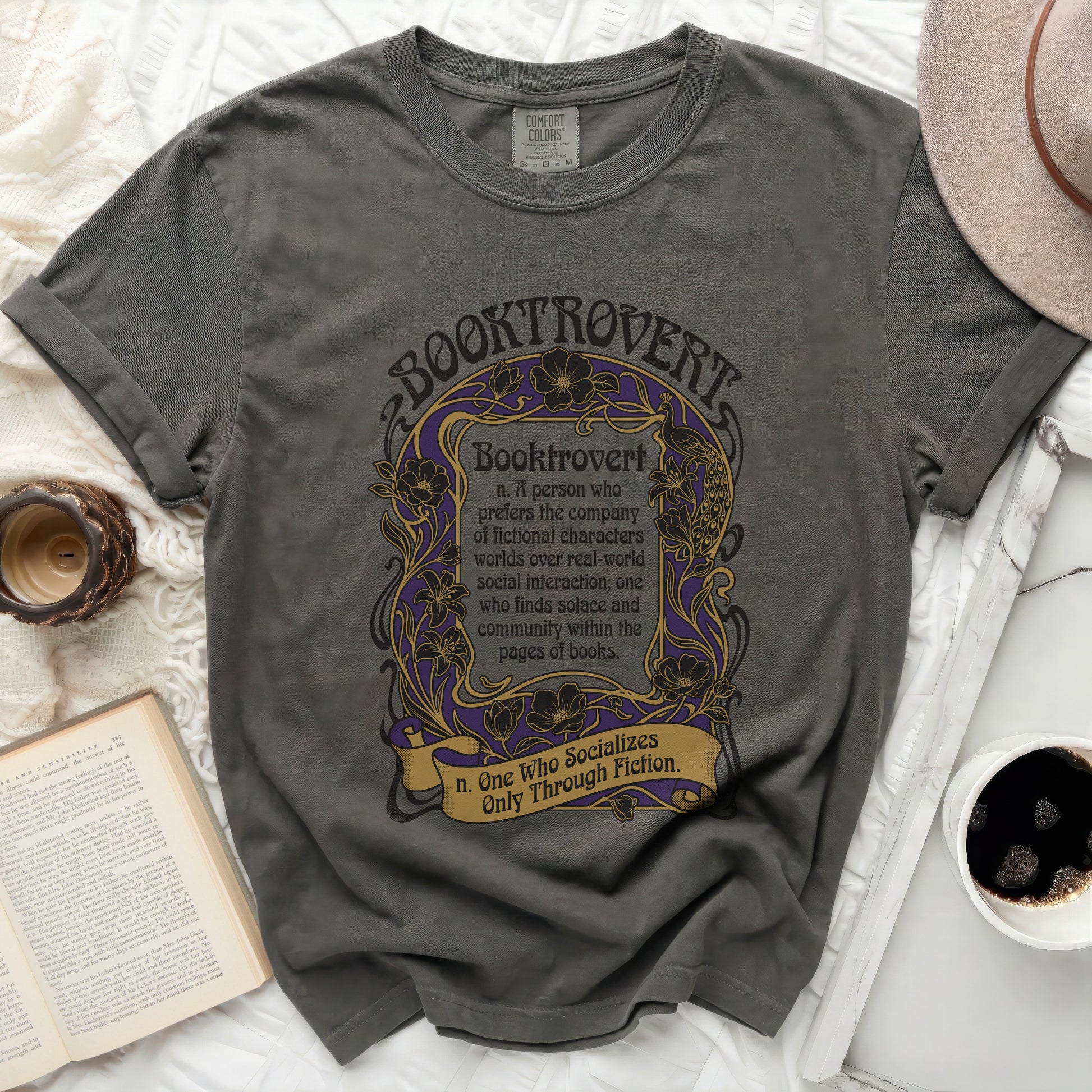 Dark grey t-shirt with "Booktrovert" definition and floral design.