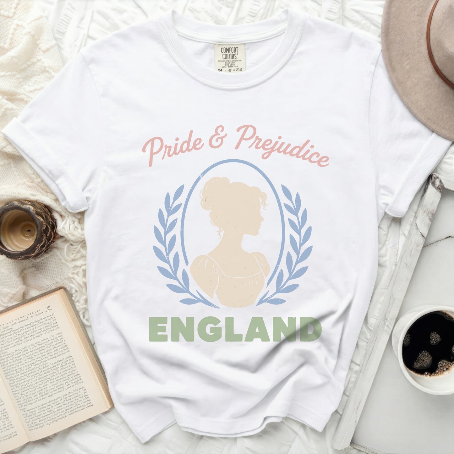 White t-shirt with "Pride & Prejudice ENGLAND" text and silhouette.