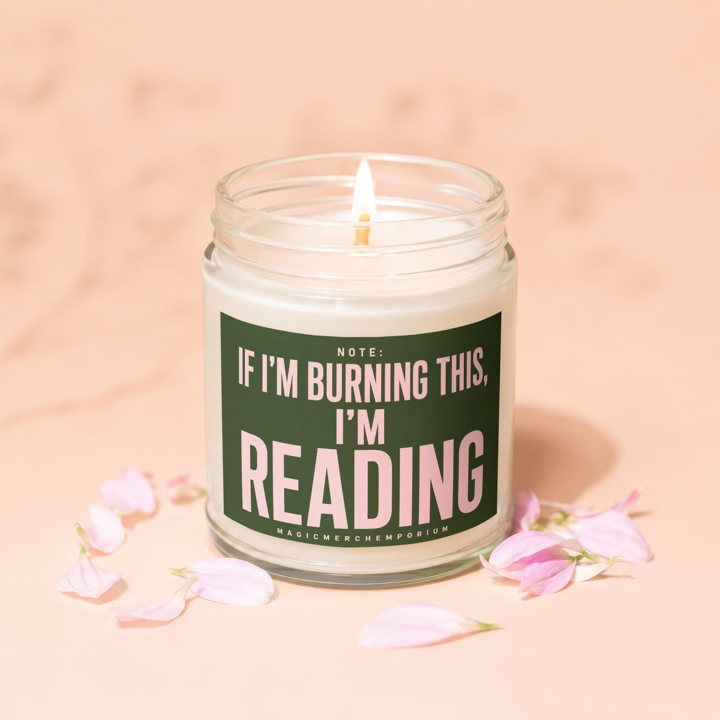 Lit candle in jar with text: Note: If I'm Burning This, I'm Reading.