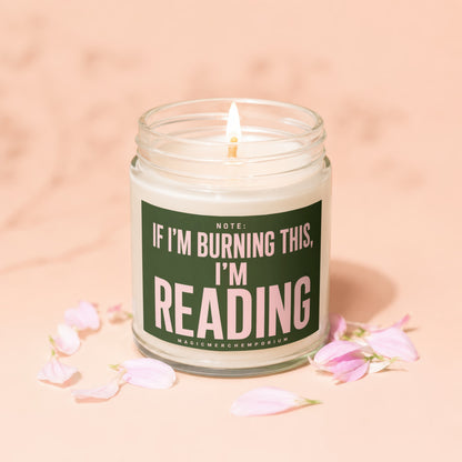 Lit candle in jar with text: Note: If I'm Burning This, I'm Reading.