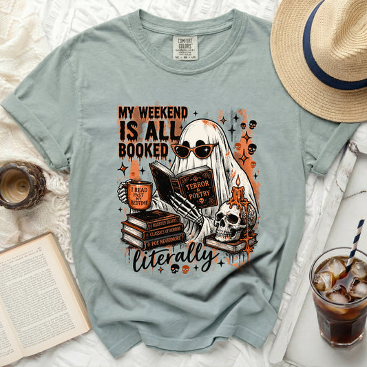 Ghost reading books titled "My Weekend Is All Booked" and "Terror & Poetry."