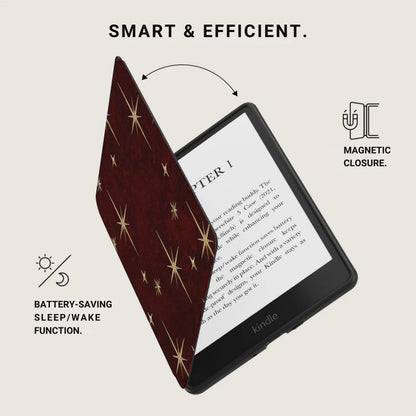 Red case with gold stars on an open Kindle, showing magnetic closure and sleep/wake function.