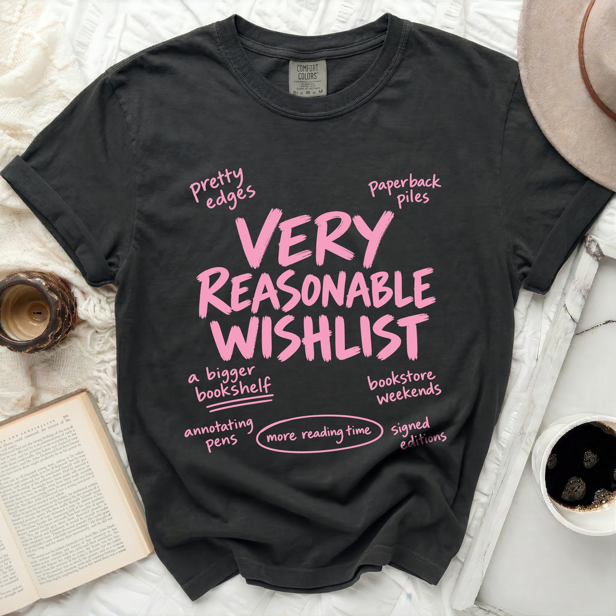Dark gray Comfort Colors t-shirt with pink text about a "VERY REASONABLE WISHLIST."
