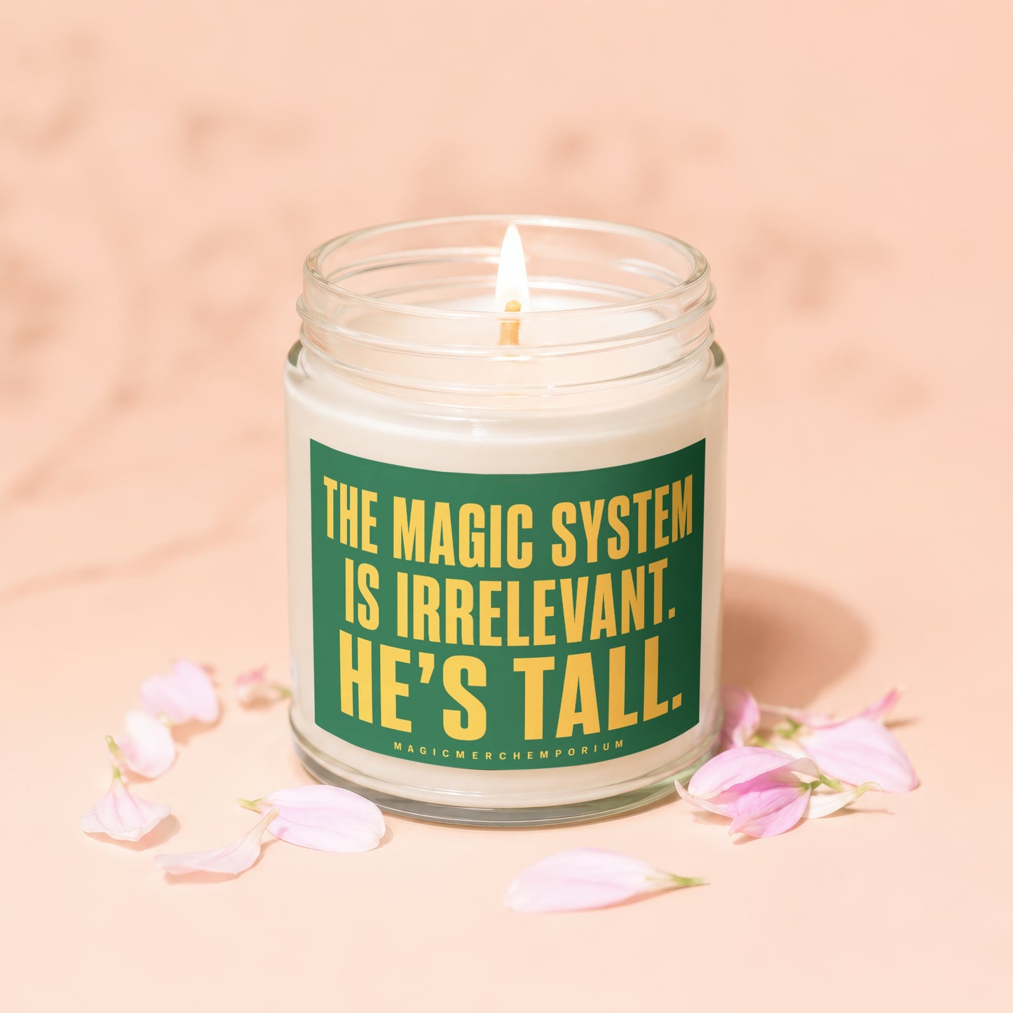 Candle with text "THE MAGIC SYSTEM IS IRRELEVANT. HE'S TALL."