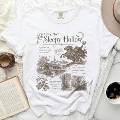 White t-shirt with Sleepy Hollow graphic featuring headless horseman, covered bridge, and text.