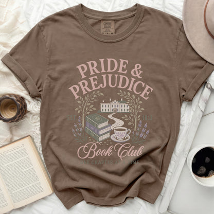 Brown t-shirt with "Pride & Prejudice Book Club" graphic and book-themed illustration.
