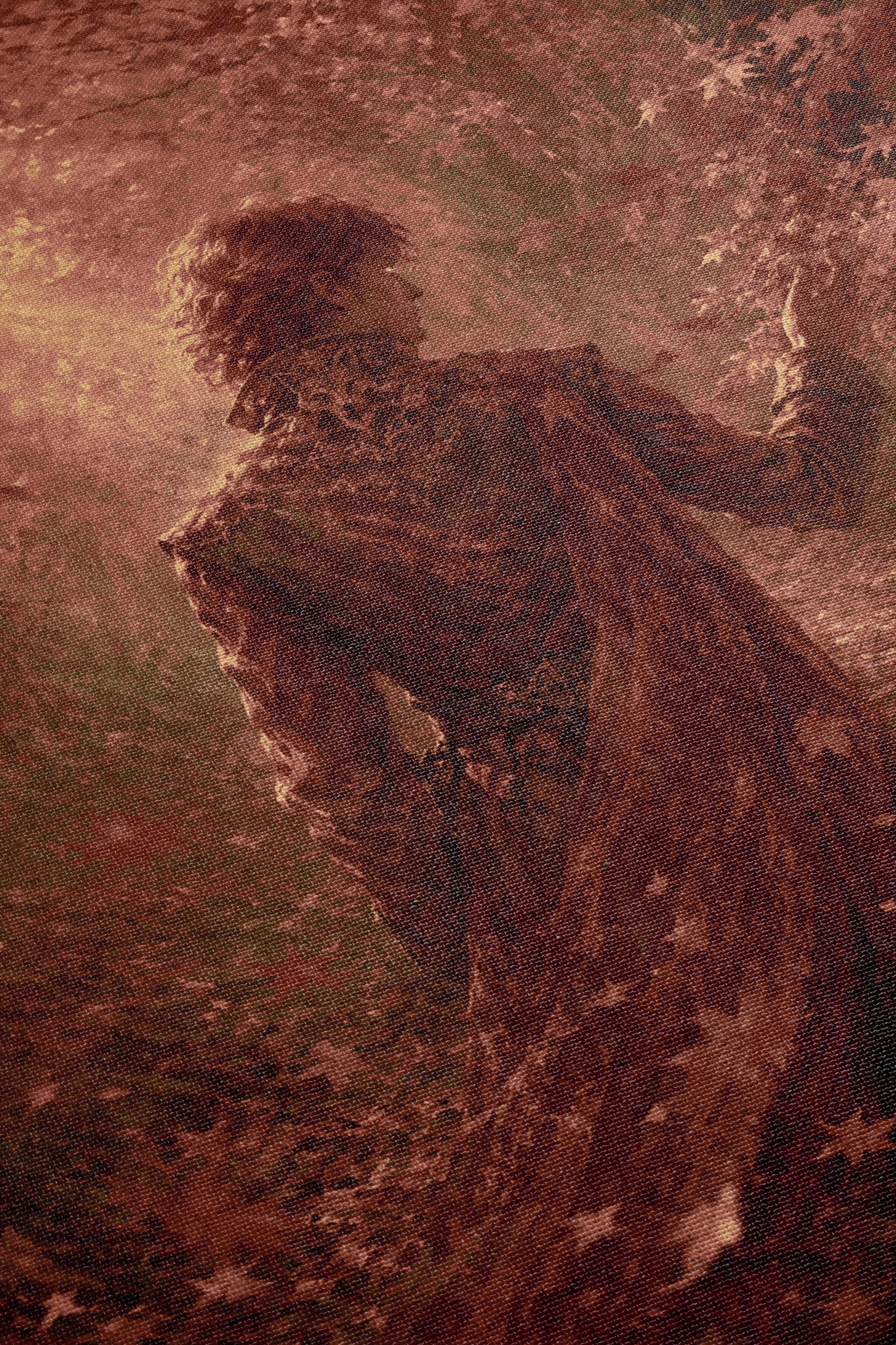 a person in a flowing, dark-colored dress standing in a forested area, with a sense of movement and dynamism.
