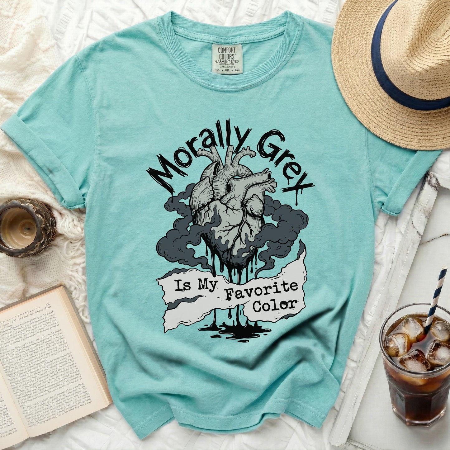 Teal t-shirt with anatomical heart graphic and text "Morally Grey Is My Favorite Color."