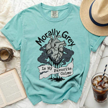 Teal t-shirt with anatomical heart graphic and text "Morally Grey Is My Favorite Color."