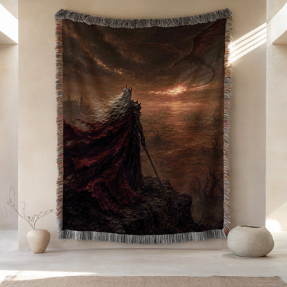 a large tapestry hanging on a wall, depicting a dark fantasy scene with a dragon and a figure in a cape.