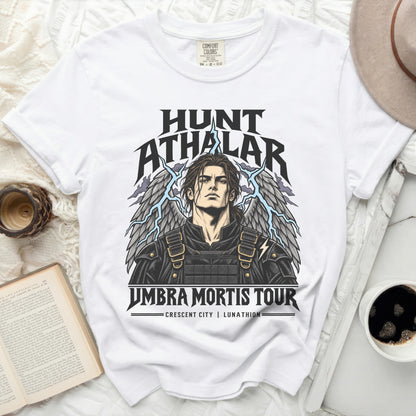 White t-shirt with "Hunt Athalar Umbra Mortis Tour Crescent City Lunathion" graphic.