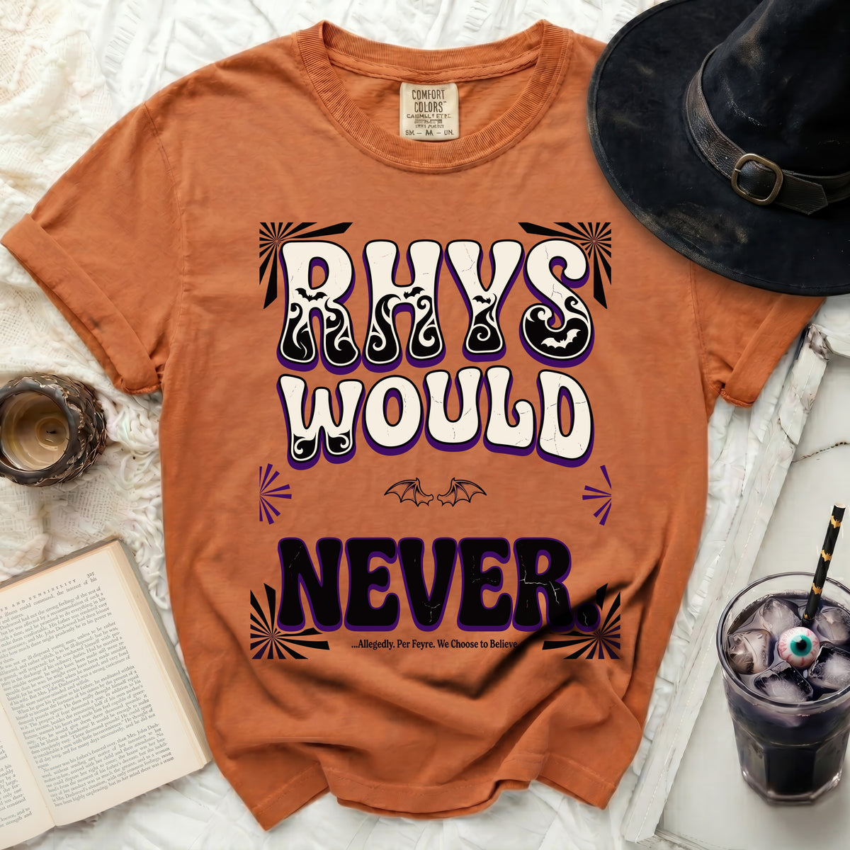 Orange t-shirt with "Rhys Would Never" text and bat graphics.