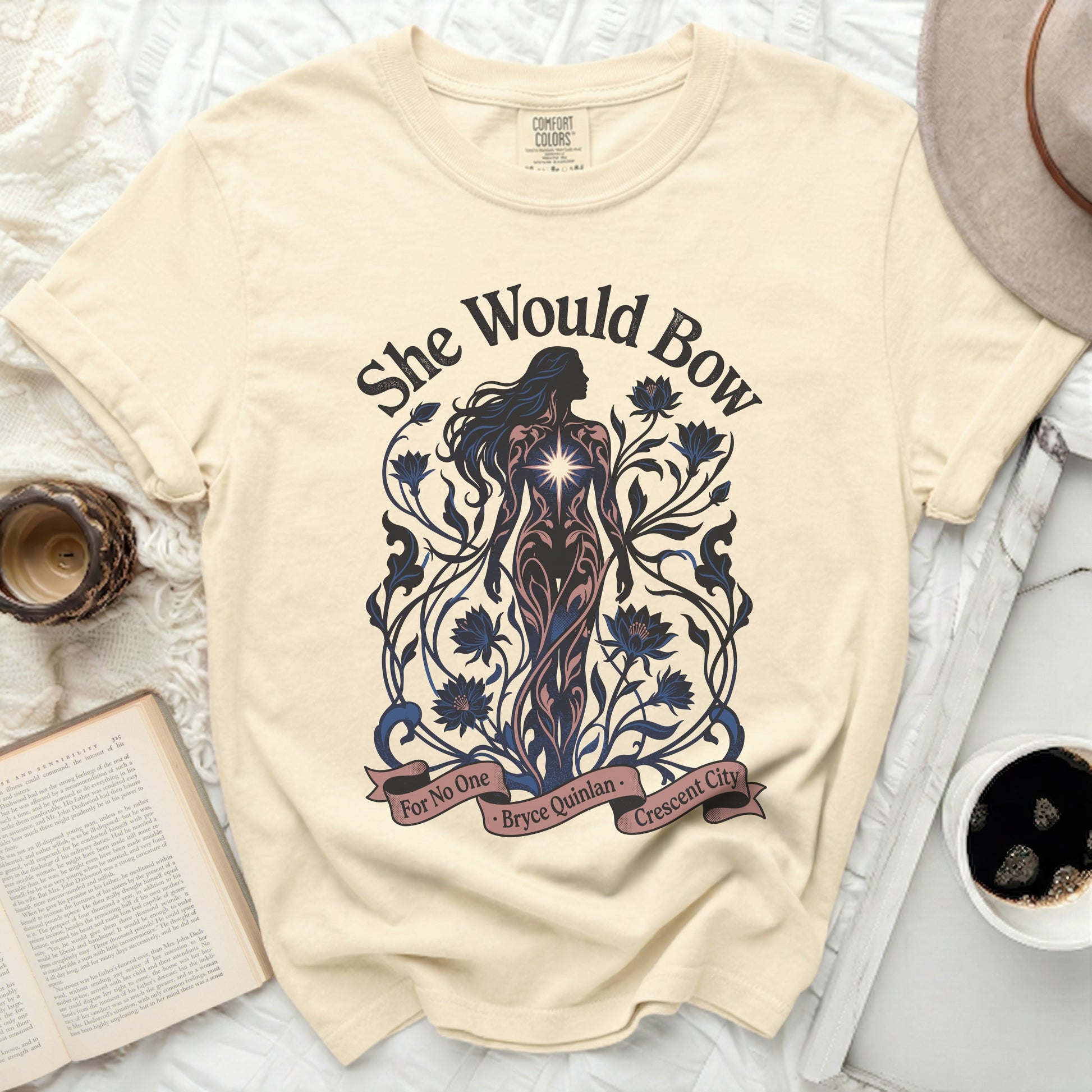Cream t-shirt with "She Would Bow" and "For No One Bryce Quinlan Crescent City" text and a woman graphic.