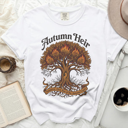 White t-shirt with "Autumn Heir" and a fiery tree design.