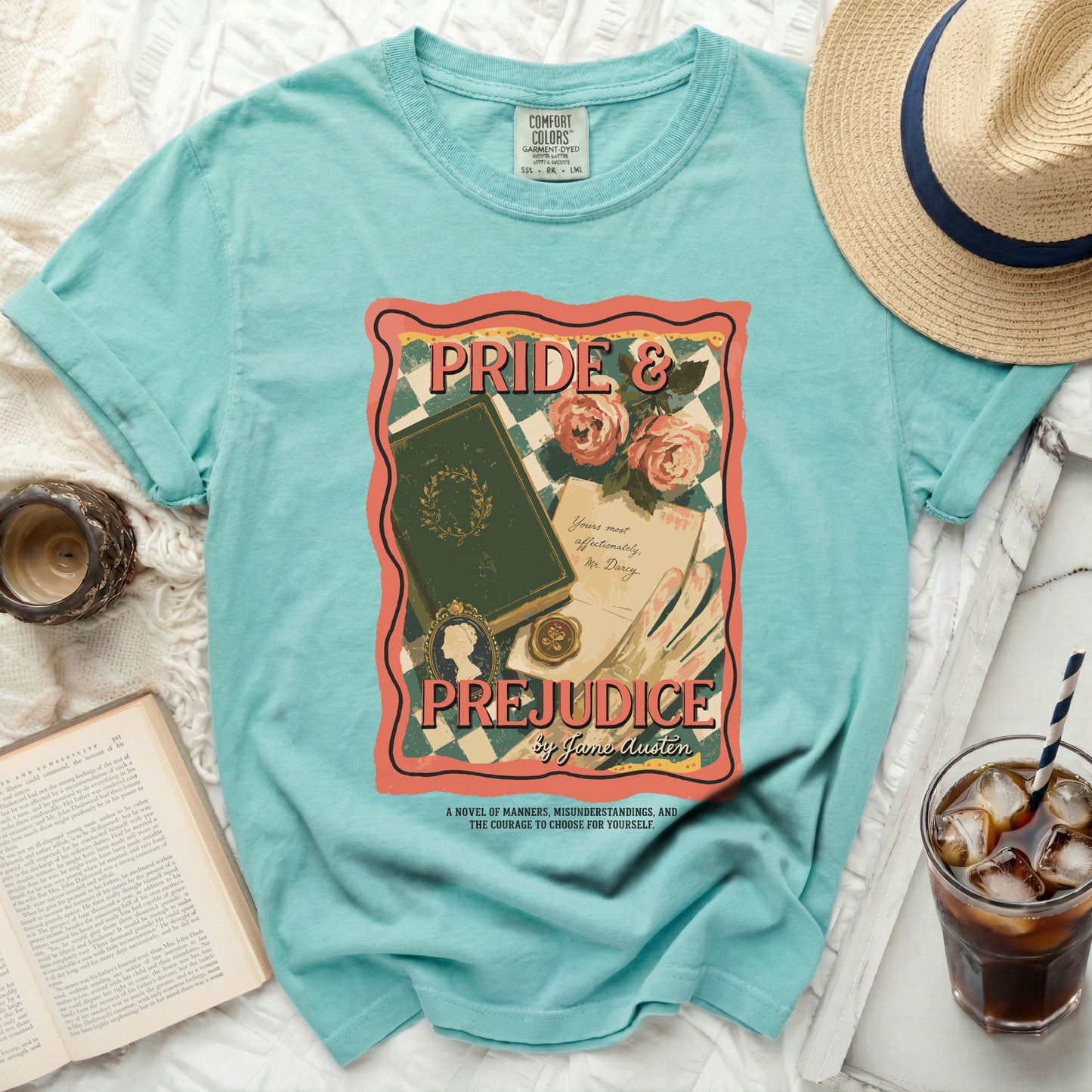 Turquoise t-shirt with Pride and Prejudice book cover graphic.