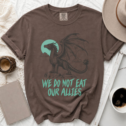 Brown t-shirt with a dragon graphic and text "WE DO NOT EAT OUR ALLIES".