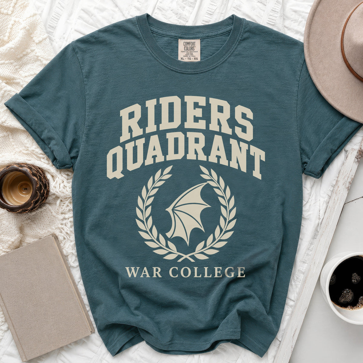 Teal t-shirt with Riders Quadrant War College text and emblem.