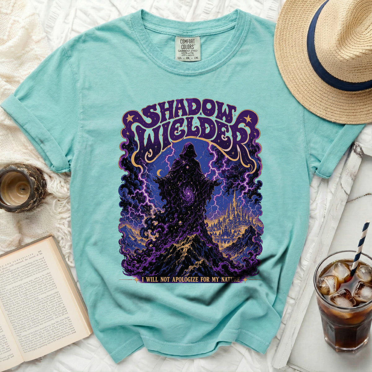 Aqua t-shirt with "Shadow Wielder" graphic and lightning.