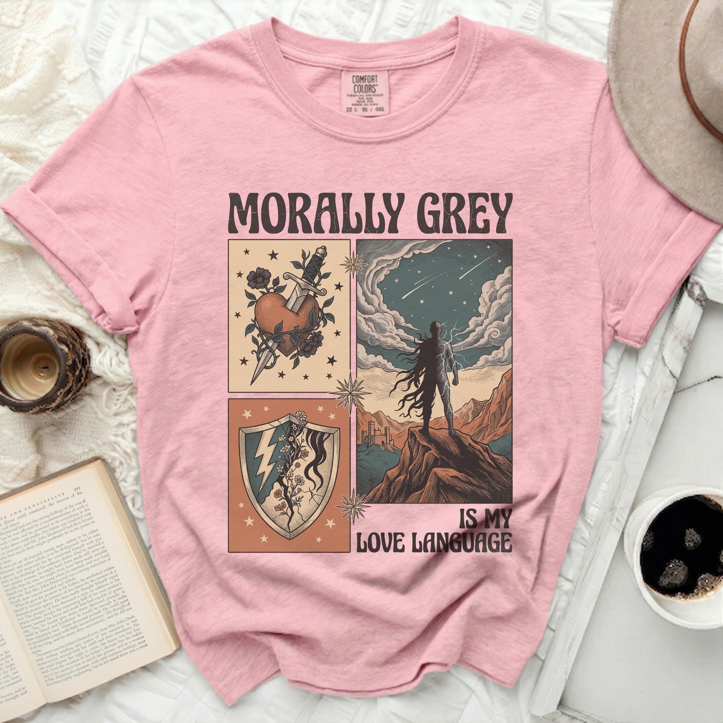 Pink t-shirt with "MORALLY GREY IS MY LOVE LANGUAGE" graphic.