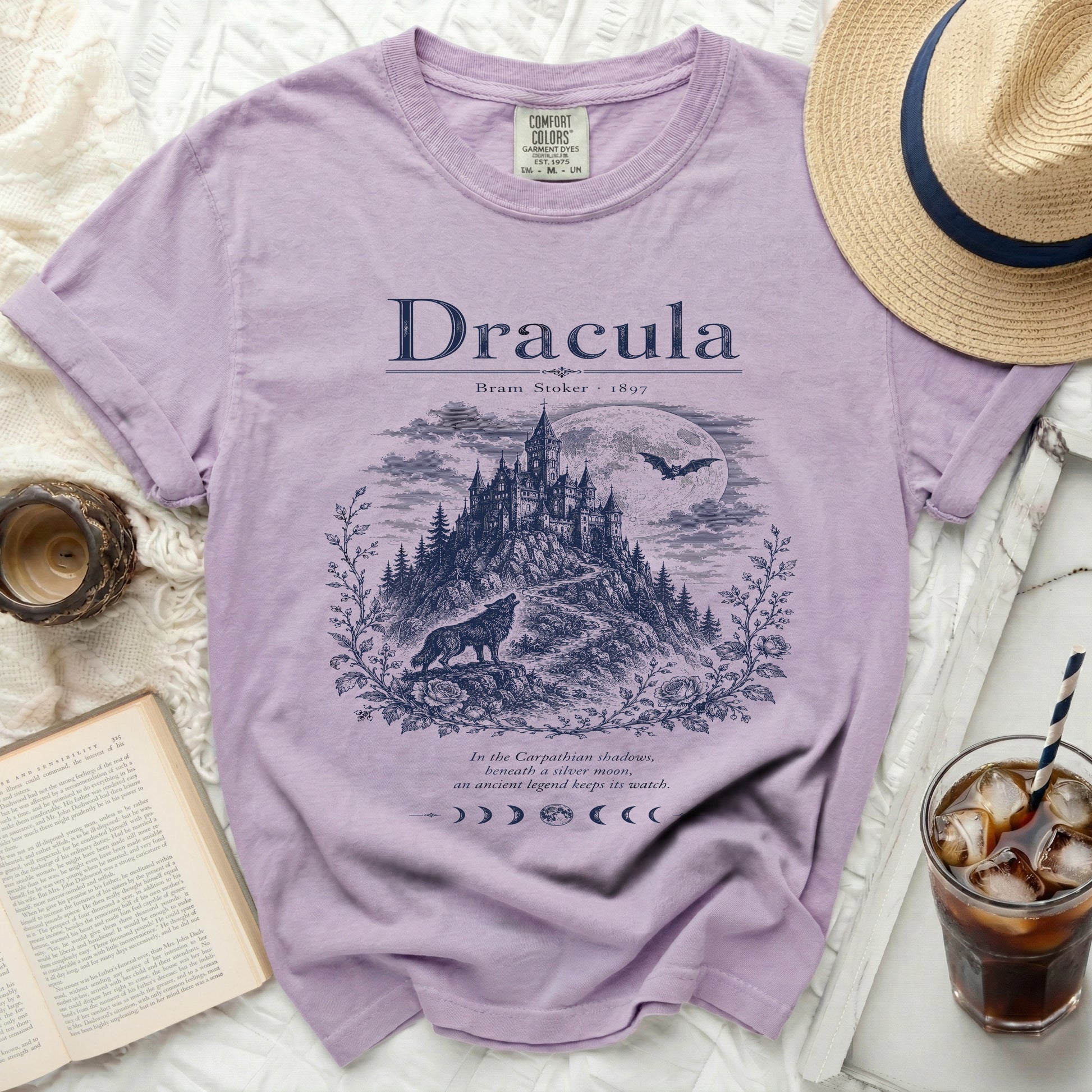 Dracula t-shirt with castle, wolf, moon, bats, and text.