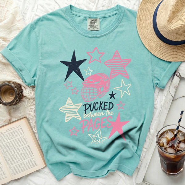 Pucked Between The Pages Tee in Island Reef