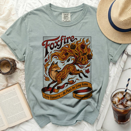 T-shirt with a fiery fox design and text "Foxfire Eris Vanserra - He Plays the Long Game Autumn Court".