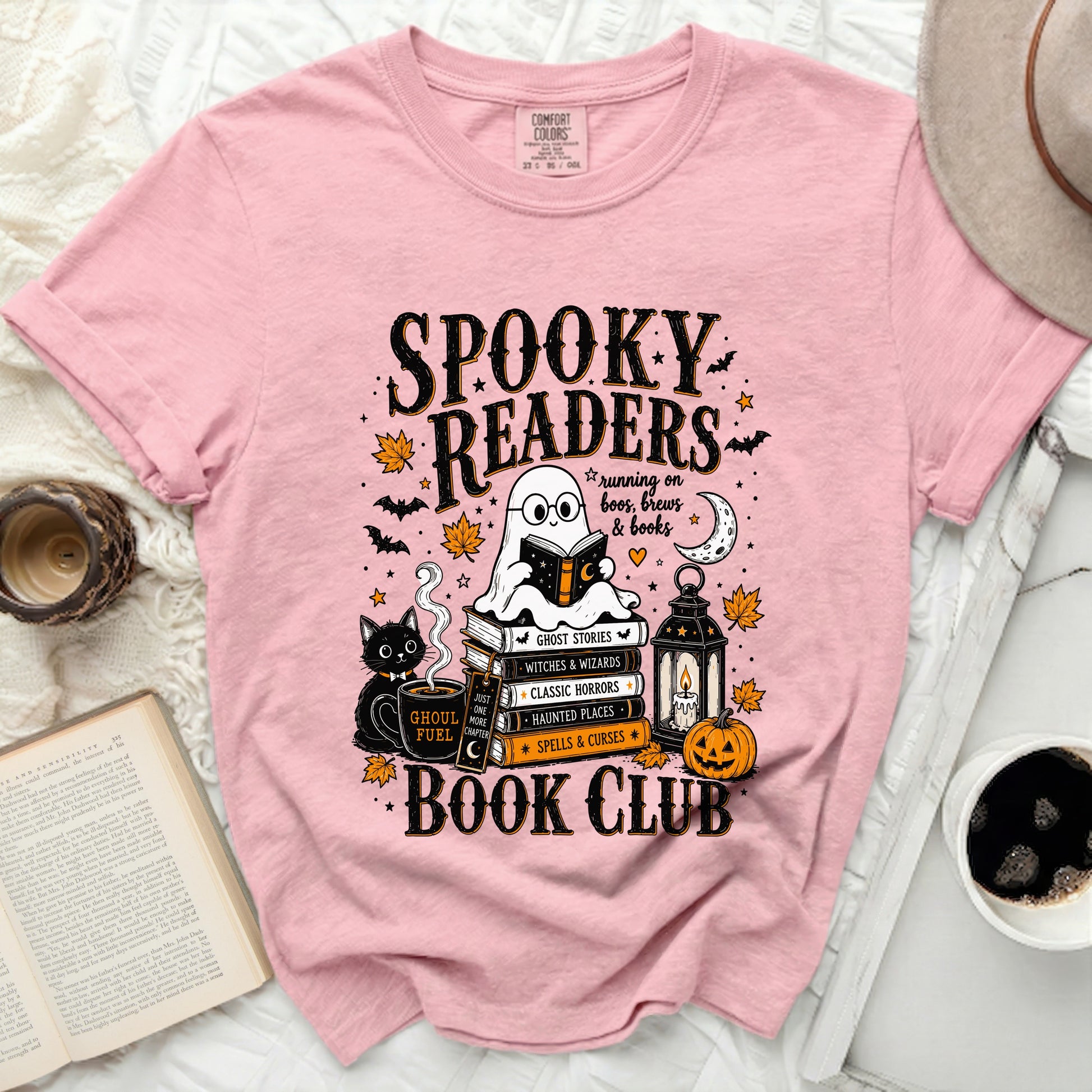 Pink t-shirt with "Spooky Readers Book Club" Halloween graphic.