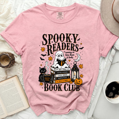 Pink t-shirt with "Spooky Readers Book Club" Halloween graphic.