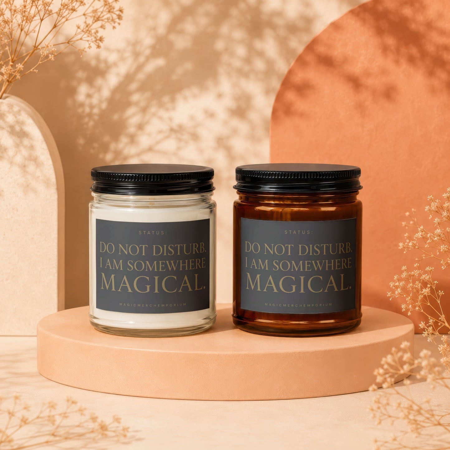 Two candles, one clear and one amber, with labels that read "DO NOT DISTURB. I AM SOMEWHERE MAGICAL".