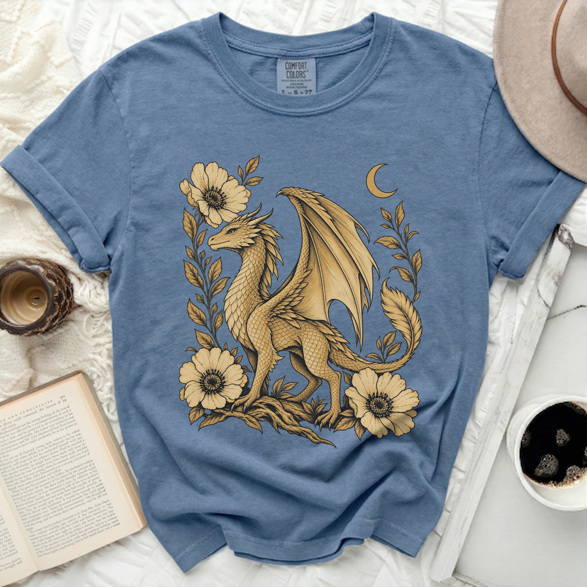 Blue t-shirt with a gold dragon and floral design, featuring a crescent moon.