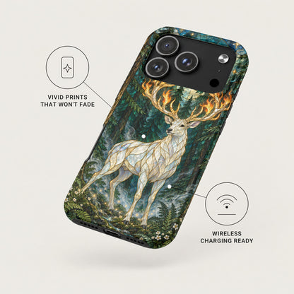 A smartphone case featuring a white stag with fiery antlers in a forest, highlighted with fade-resistant print and wireless charging icons.