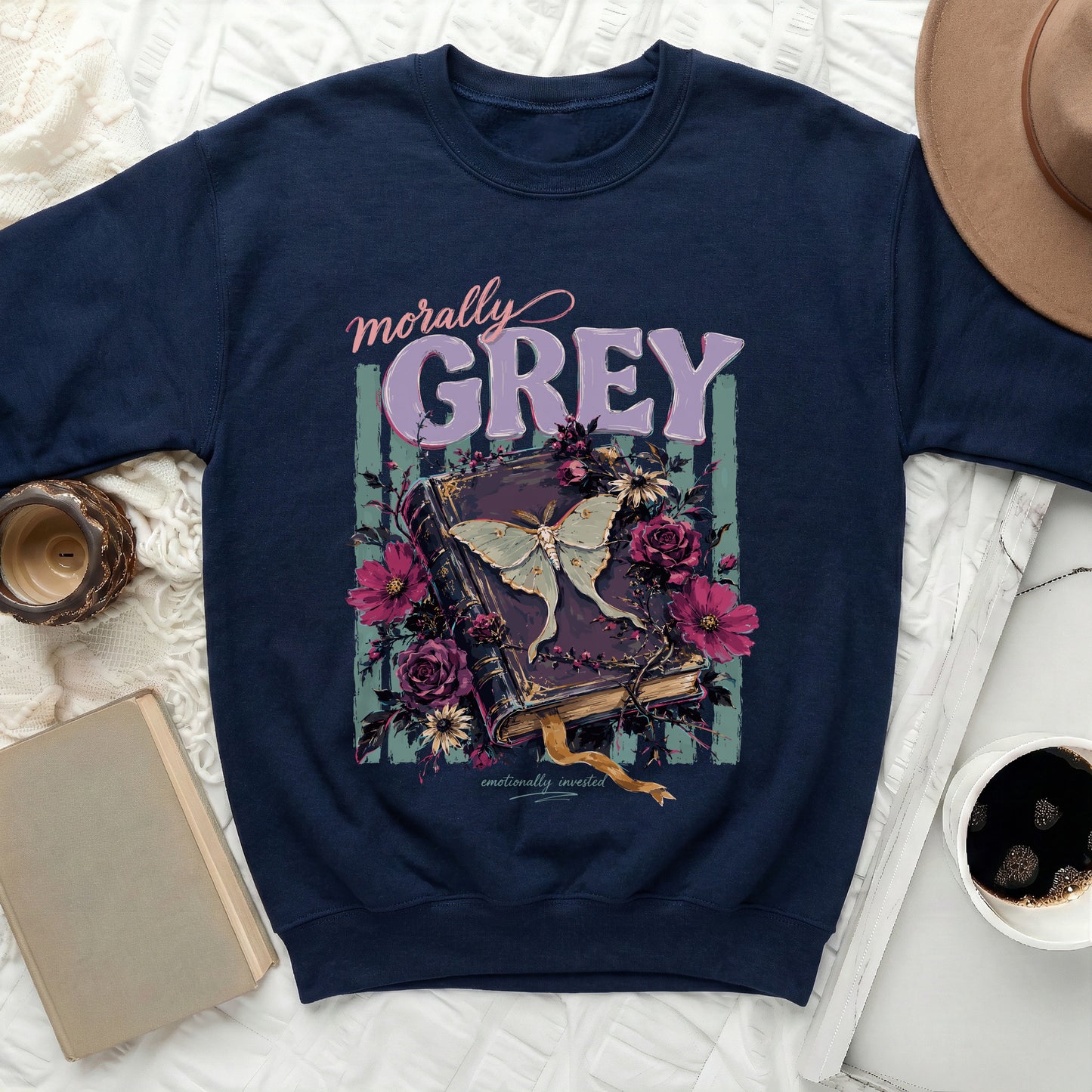 Navy sweatshirt with "Morally Grey" text and a moth on an open book.