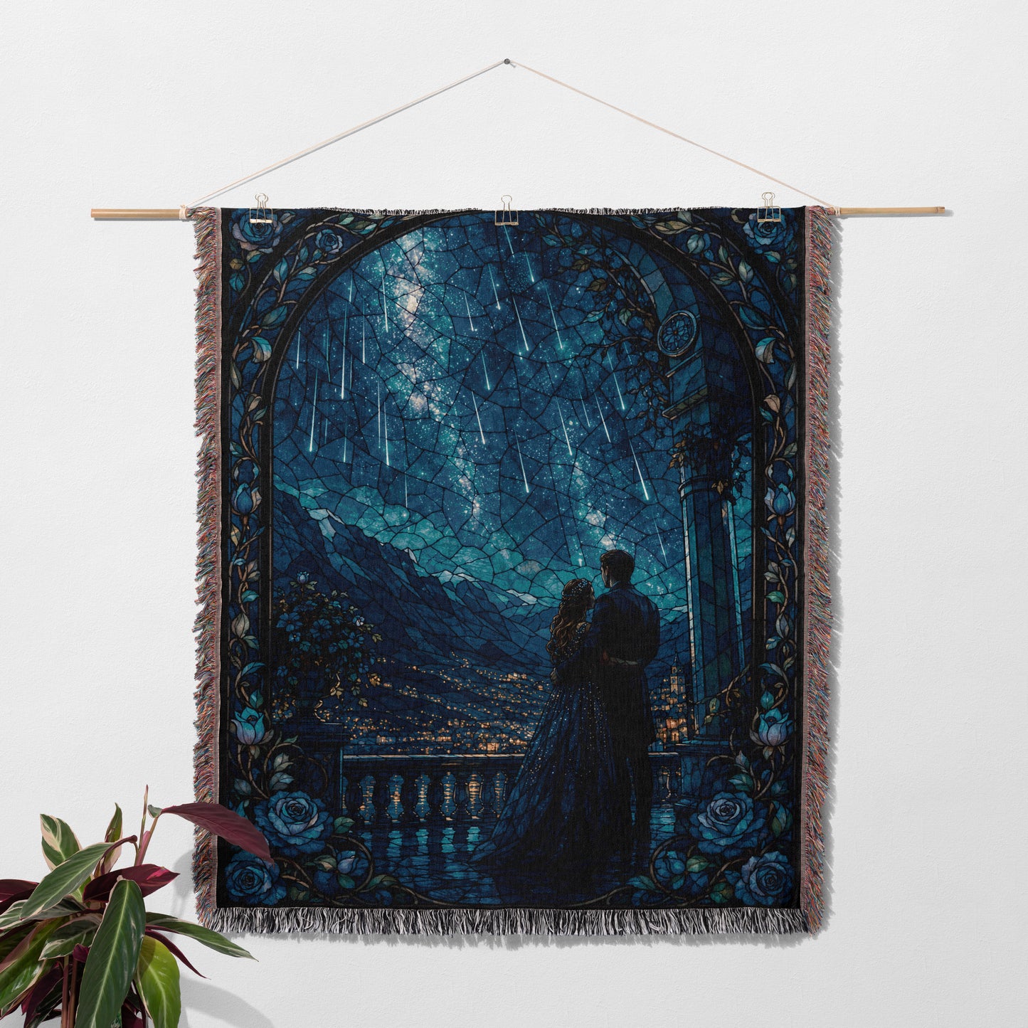 a tapestry hanging on a wall, depicting a couple standing together under a night sky filled with shooting stars.